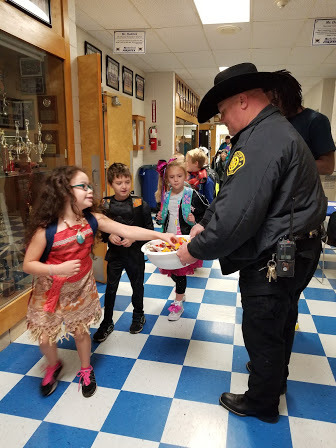 Deputy Scott sharing candy