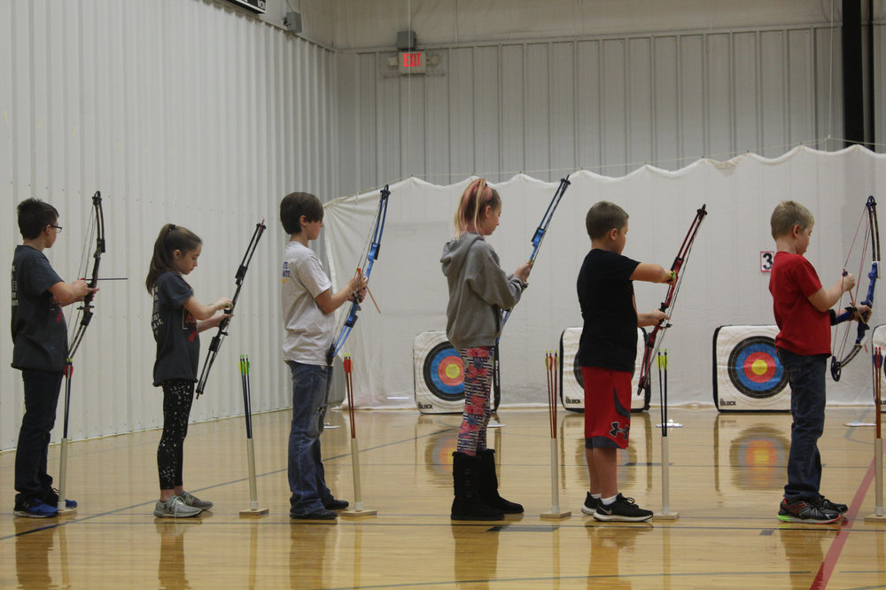Macks Creek Archers with others during tournament